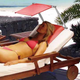 Illustration for article titled Beach Pillow With Built-in Shade is Good Excuse to Post Oiled Lay-deez